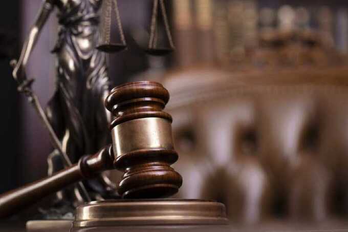 Суд вынес приговор главе «Фалунь Дафа» к четырём годам лишения свободы в колонии